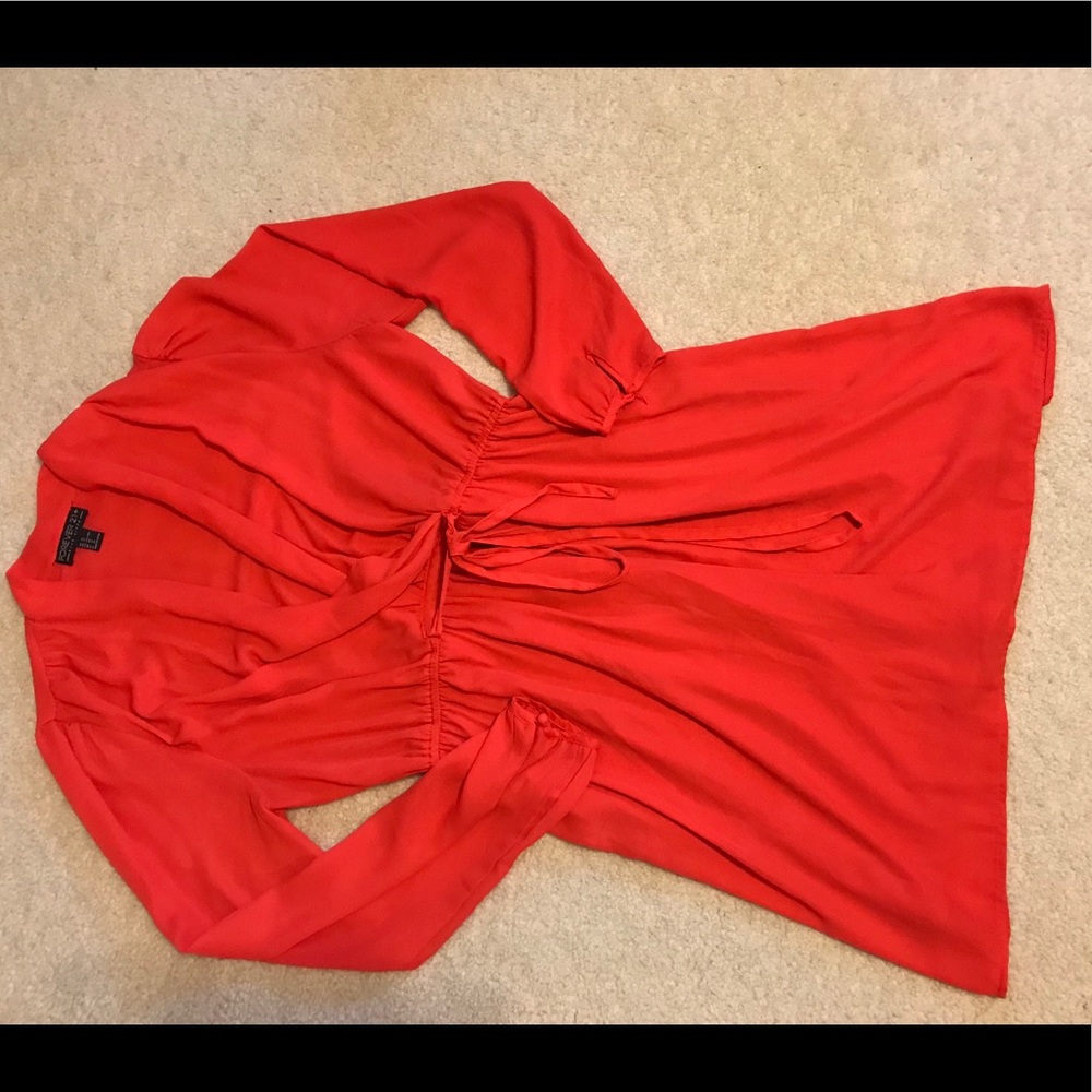 Wrap (top) dress with gathered waist.